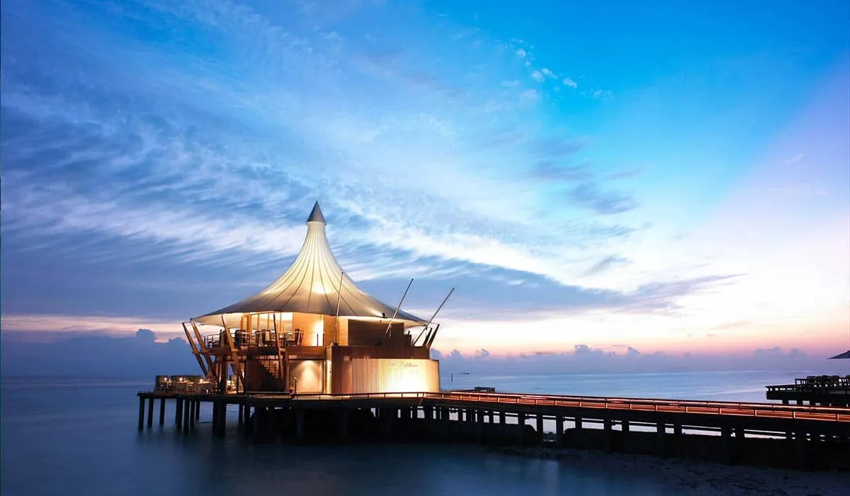 The Lighthouse restaurant over the water at dusk