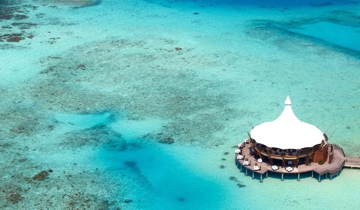 Aerial view of the Lighthouse restaurant over the turquoise lagoon