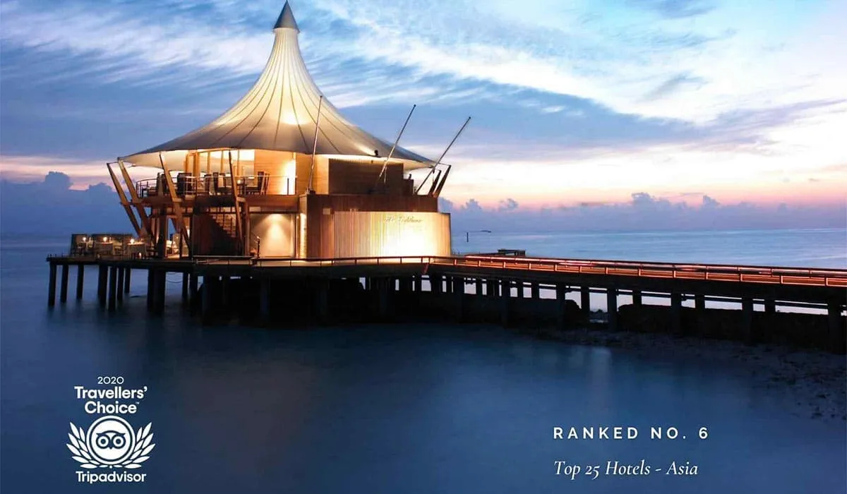 The Lighthouse restaurant at dusk with 2020 Tripadvisor Travellers' Choice badge: Ranked No. 6, Top 25 Hotels – Asia