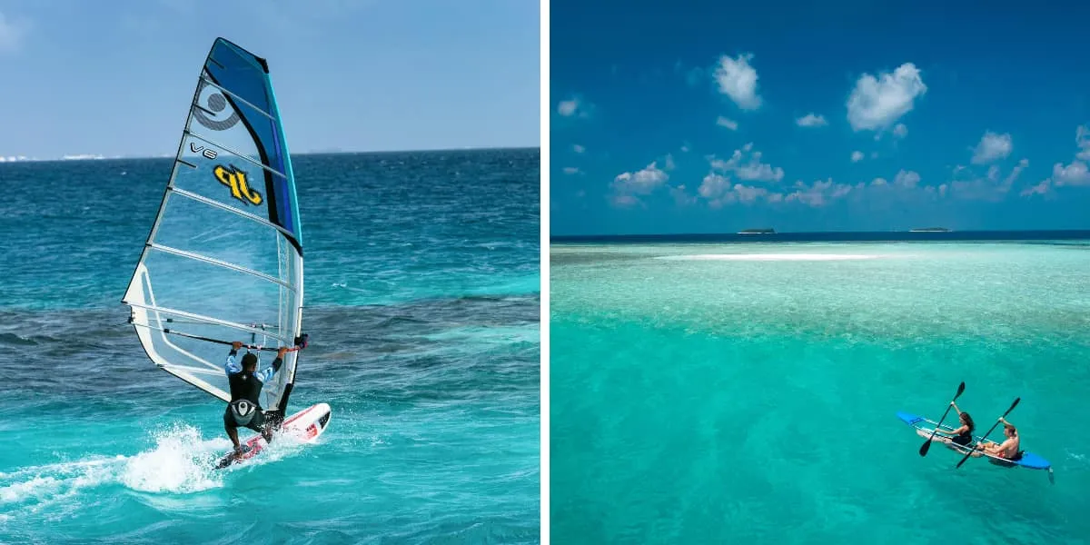 Windsurfer on the lagoon, and two people kayaking in turquoise water