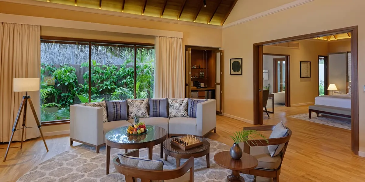 Spacious Baros Residence living room with sofas and garden views