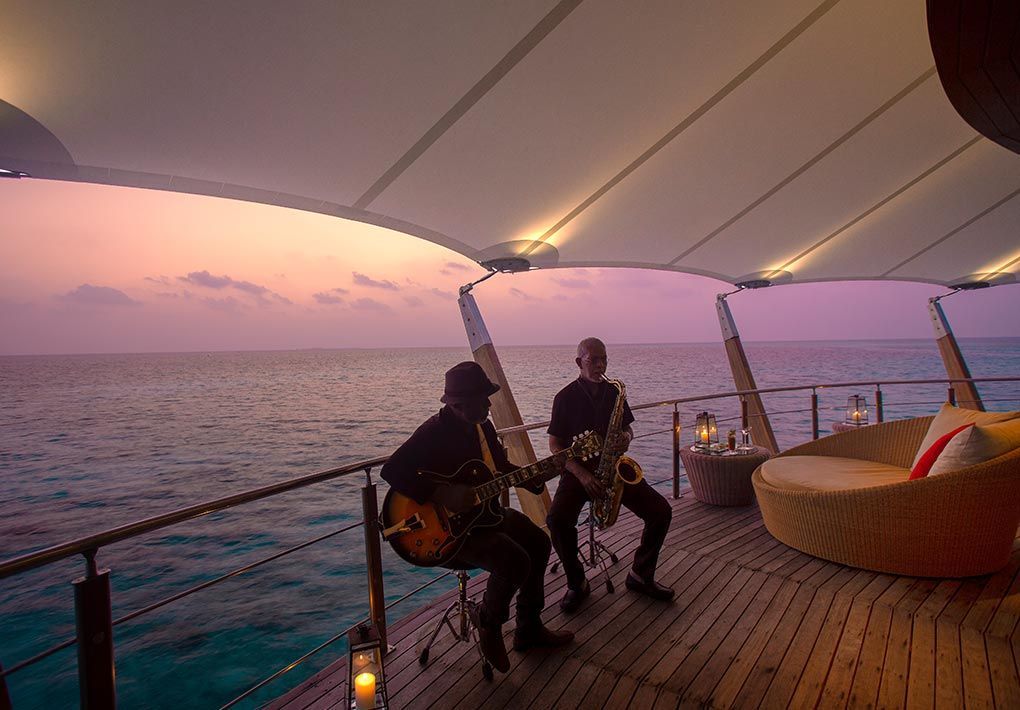 Live music on the deck of The Lighthouse Lounge at sunset