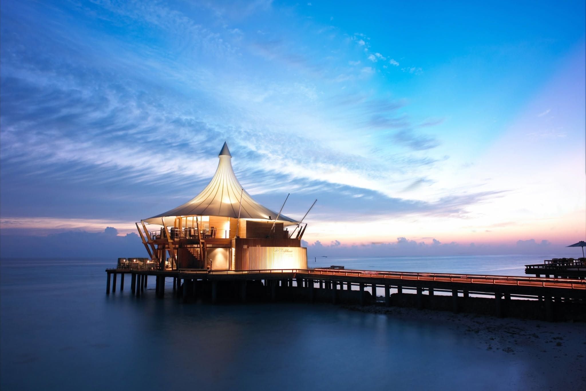 The Lighthouse Lounge and its jetty at sunset