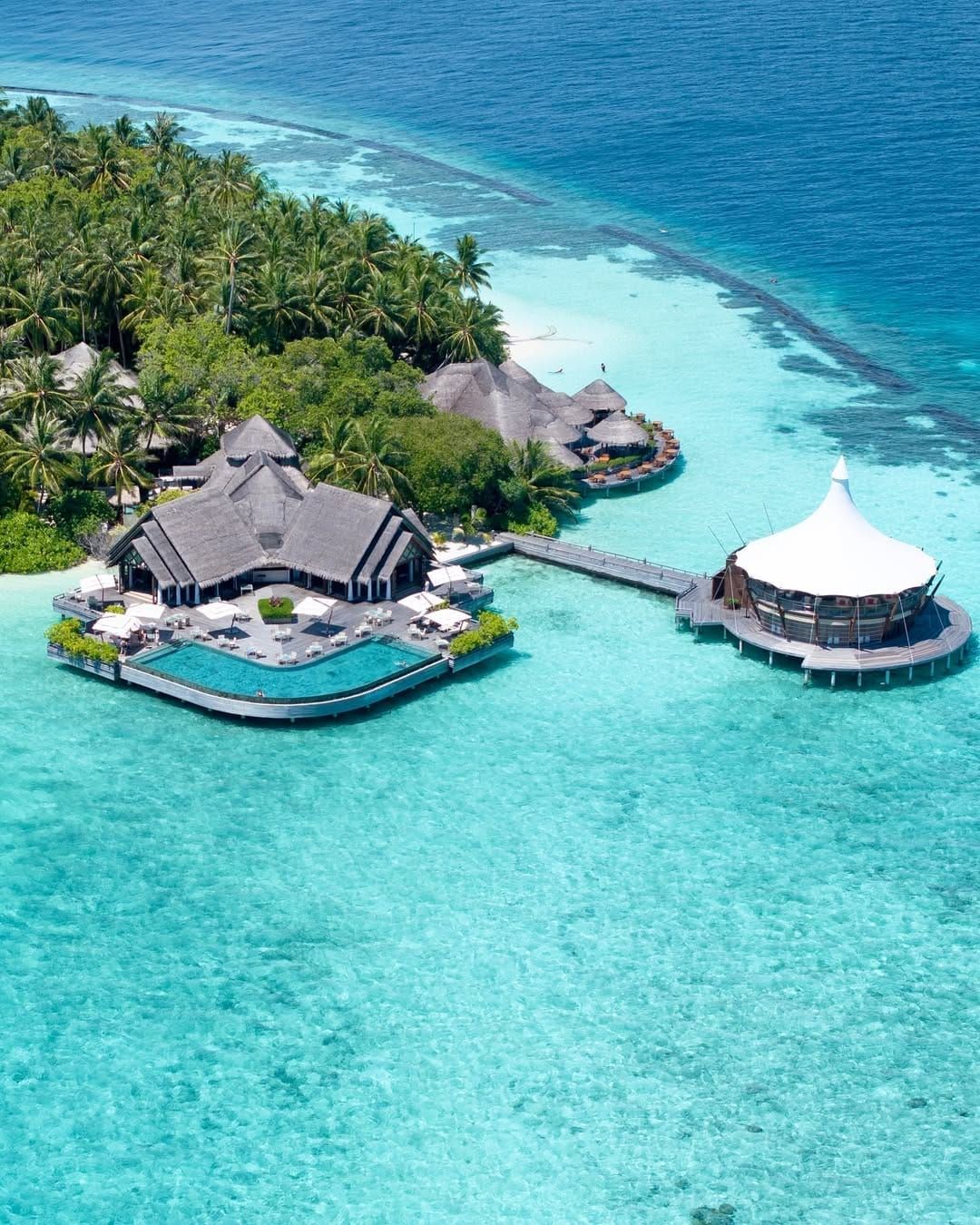 Aerial view of the domed overwater restaurant and Lighthouse on the lagoon