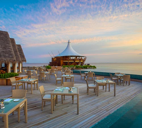 Spacious Wooden Deck Dining Areas at Baros Maldives 