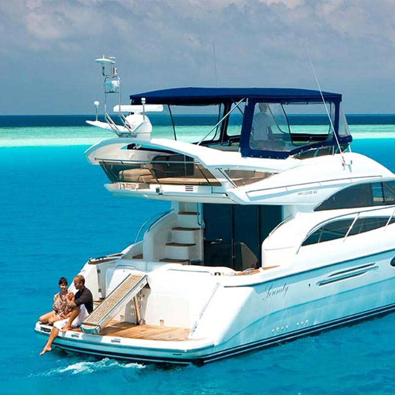 Couple Relaxing on a Private Yacht at Baros Maldives 