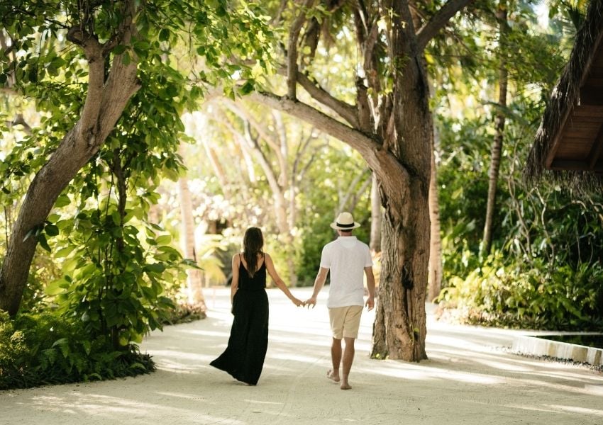 Couple Walking in a Luxury Resort in Maldives