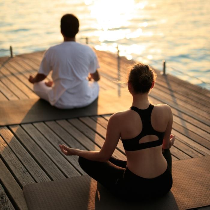 Couple Doing Meditation in Maldives 