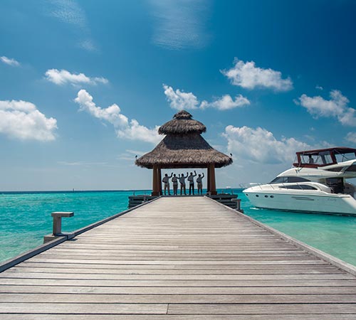 Arrival Jetty with Yacht at Baros Maldives 