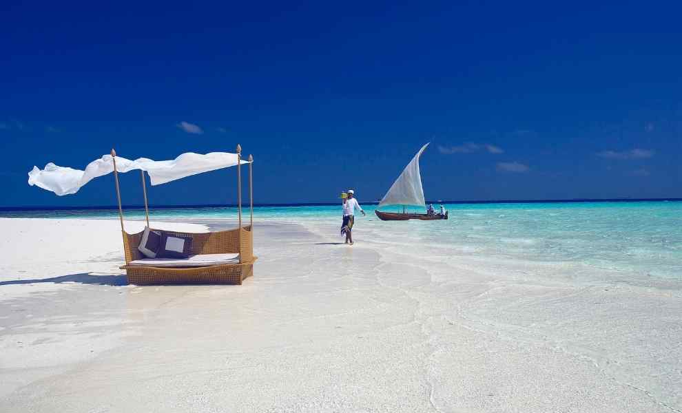 Guest walking on the Beach in Maldives