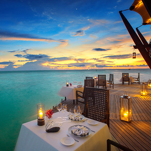 Dining Areas with Wooden Deck at Baros Maldives 