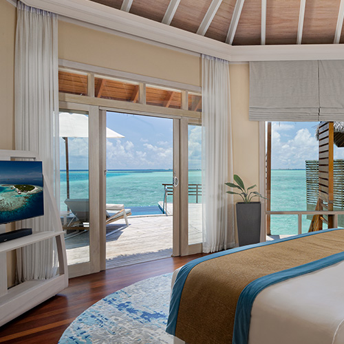 Interior of a water pool villa at Baros Maldives