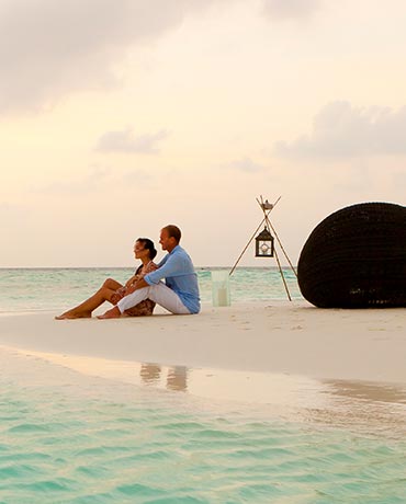 Couple Having a Romantic Moment at Baros Maldives