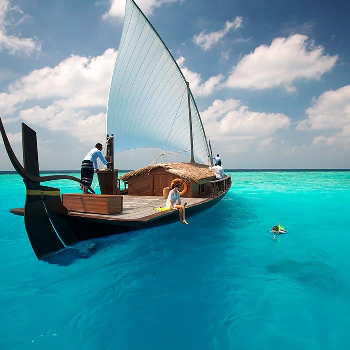 Couple Sailing on a Cruise at Baros Maldives