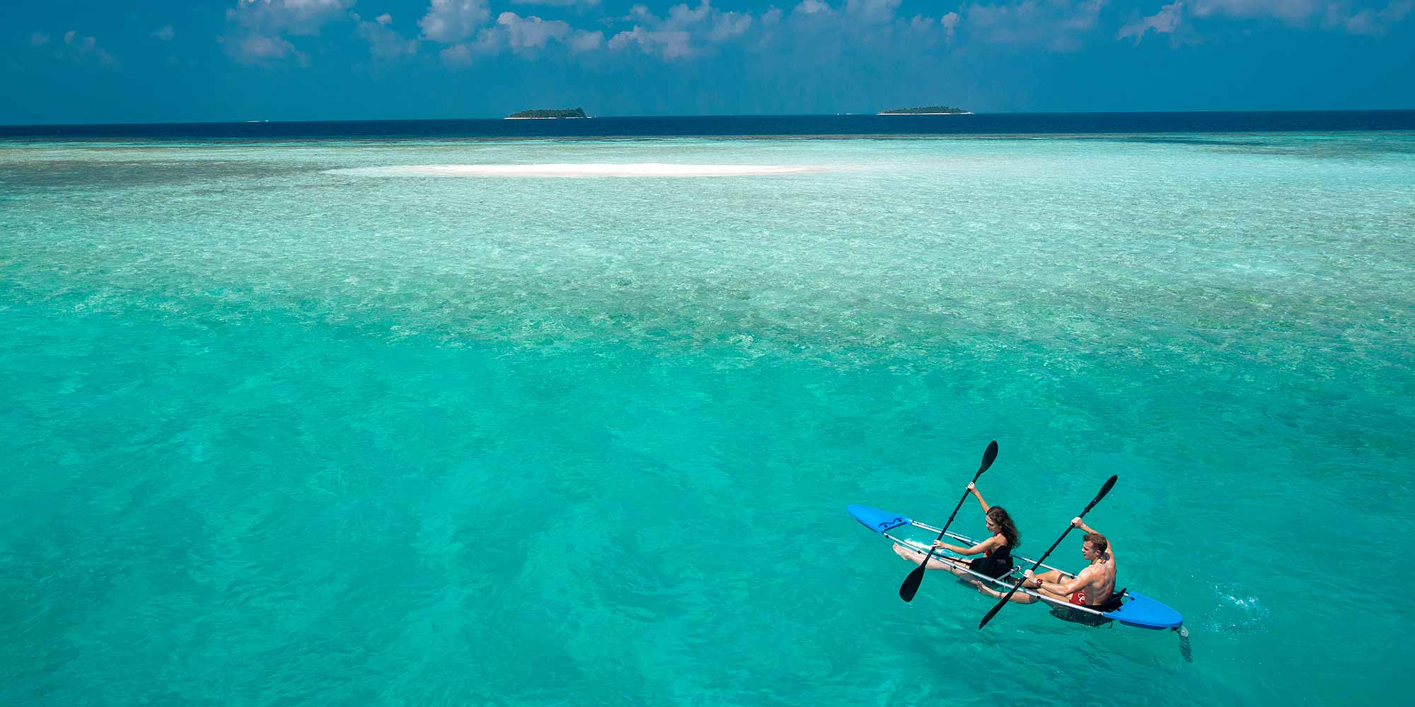 Kayaking Couple in Maldives