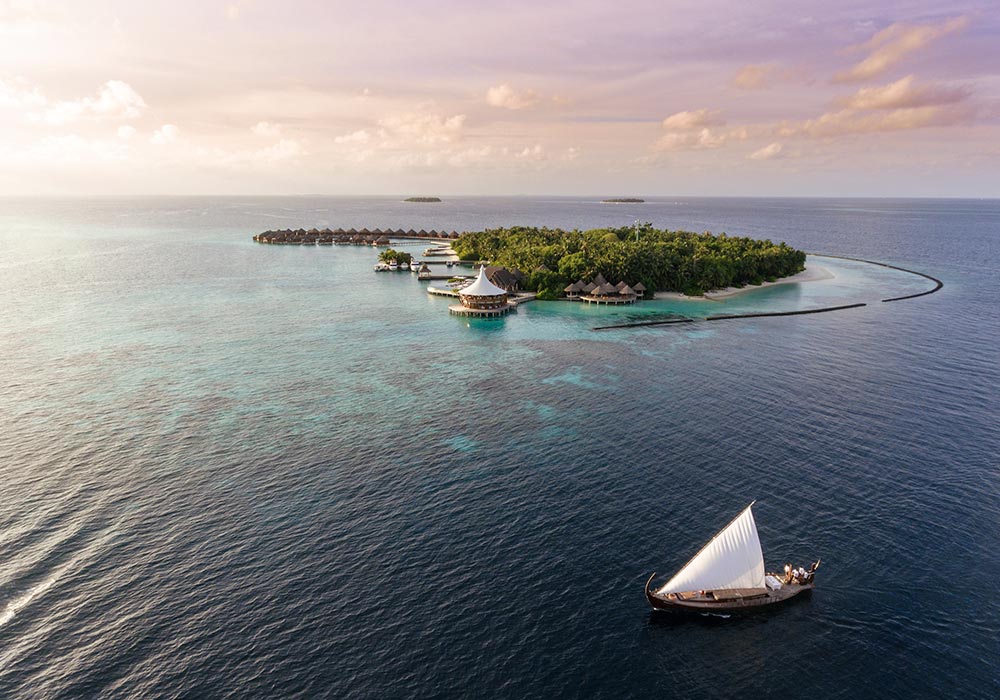 Boat Sailing Near Luxury Resort in Maldives 