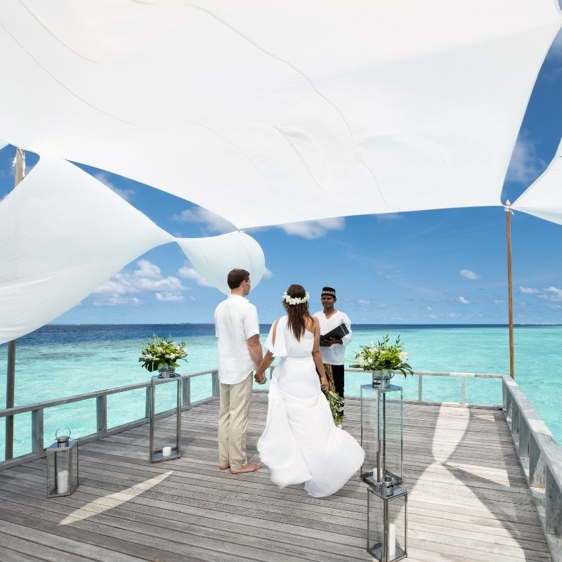 Romantic Celebrations on Wooden Deck at Baros Maldives 